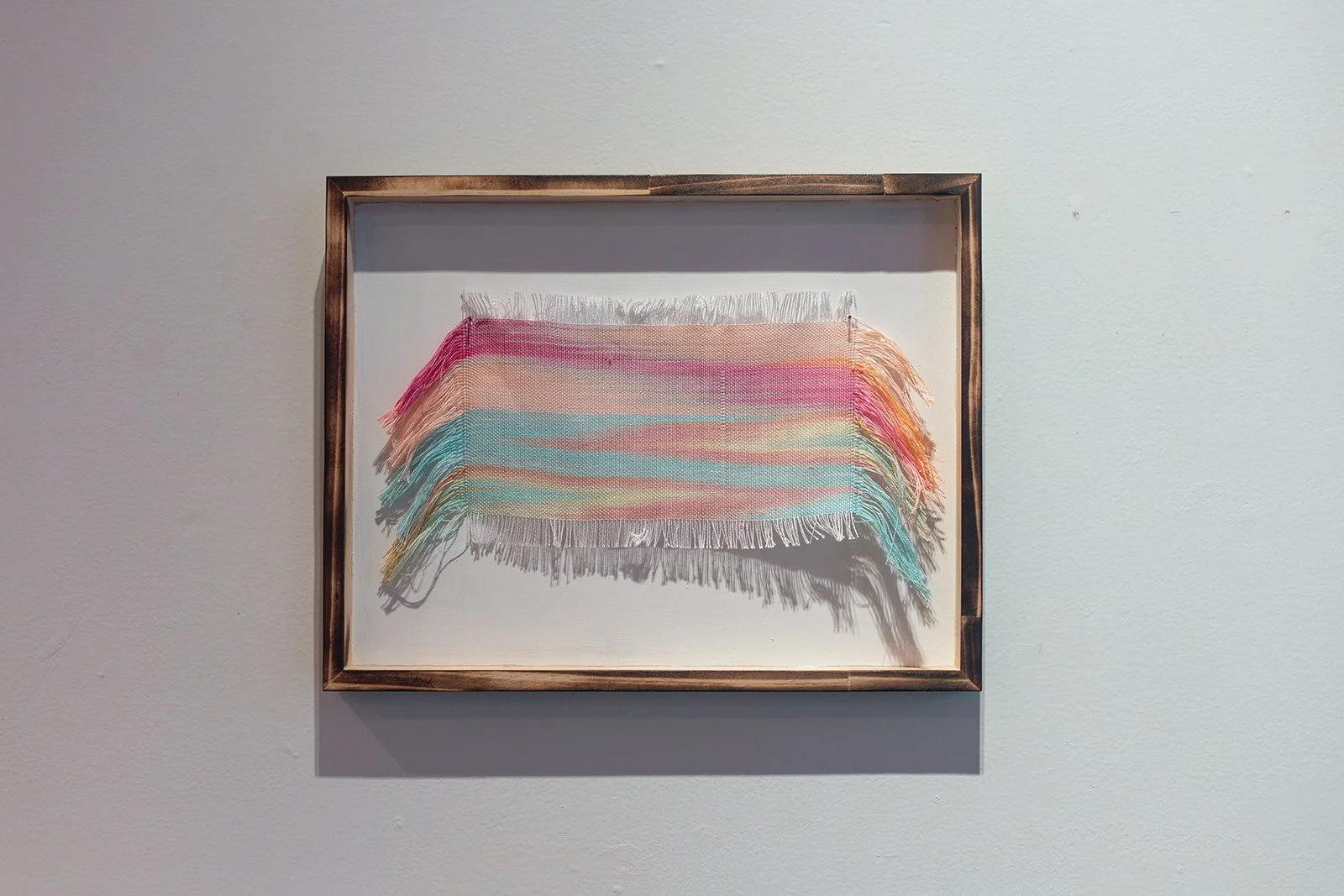 neon desert, mixed fibers,hand woven weft painted basket weave,14x11x3” 2025
				$200