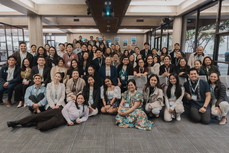 A large group of CYFAM conference attendees together for a group photo.