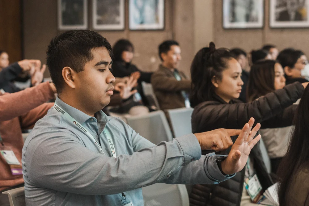 Attendees take part in an interactive workshop session