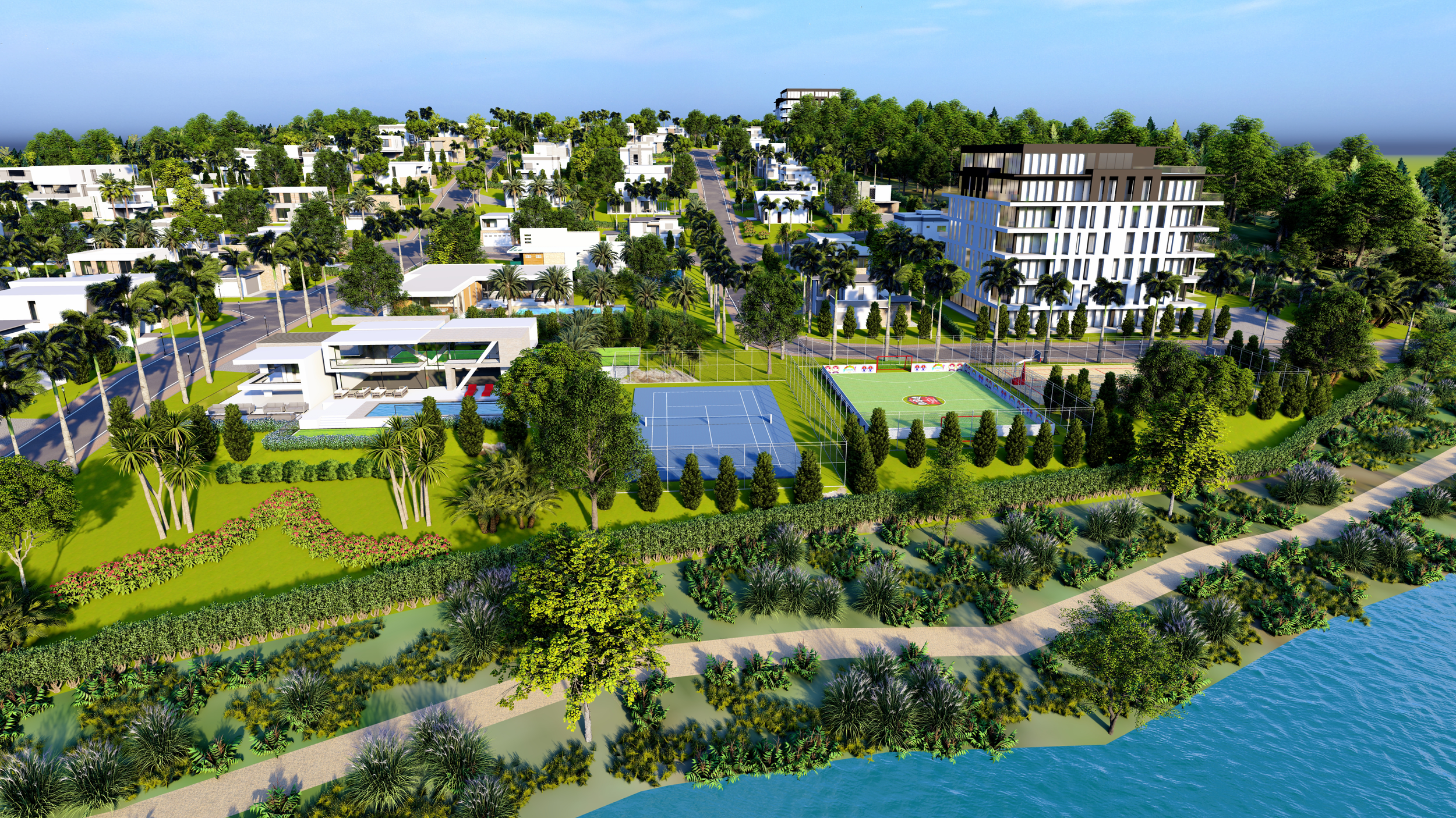 Aerial view of a modern residential community with tennis courts, a sports field, swimming pool, landscaped gardens, roads, and multi-story buildings near a water body.