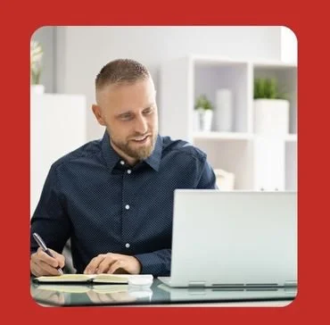 A man participating in an online counselling session from home using a laptop, representing secure, convenient mental health support for gay, bisexual, queer, and LGBTQ+ men through Bent Couch.