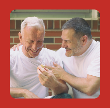 Gay couple sharing a warm moment together, representing LGBTQ relationship counselling and couples therapy at Bent Couch Australia.