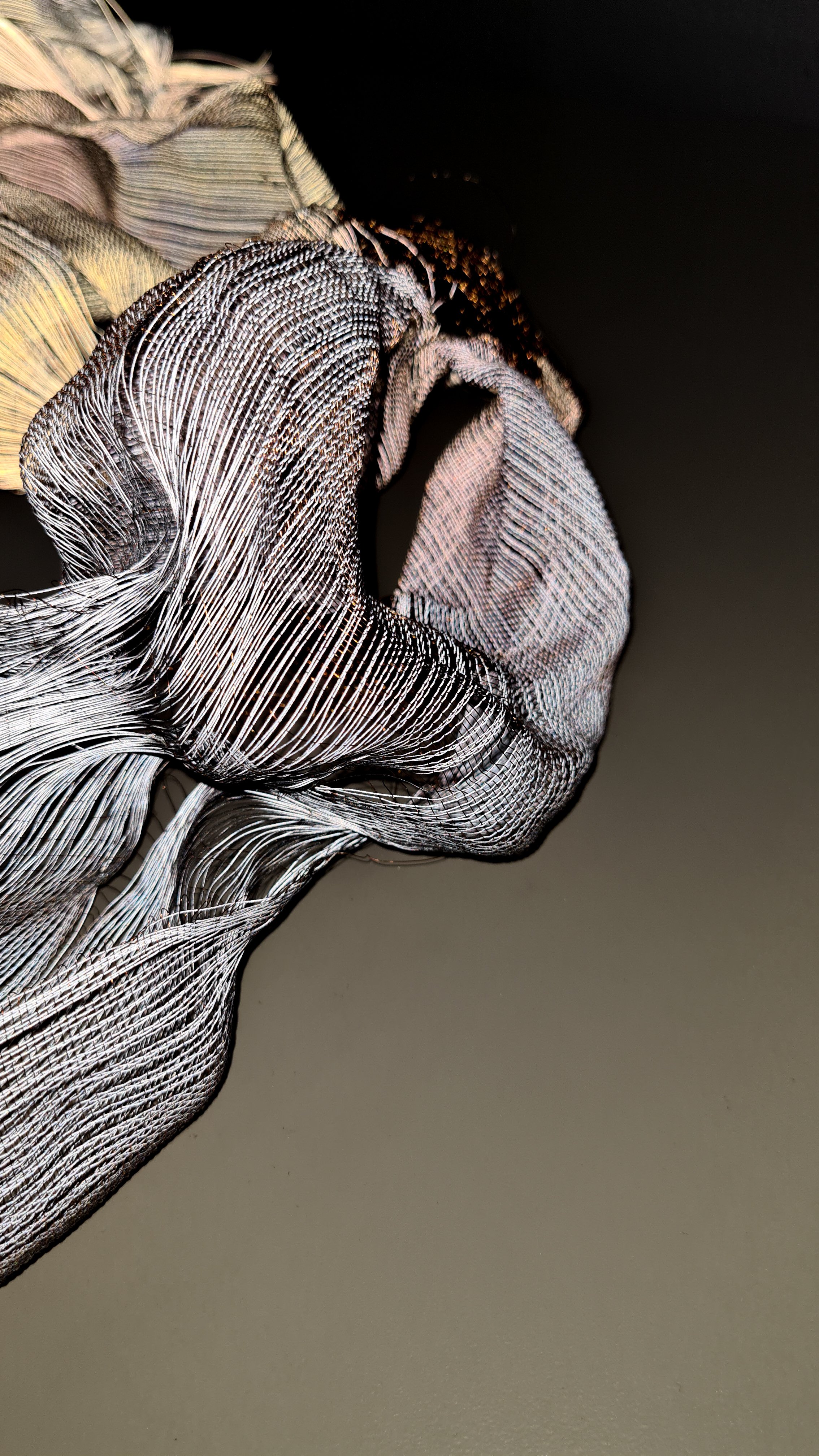 'Branching' detail (flash lighting), 2024, Melanie Olde, handwoven multi-layered reflective thread, copper wire.