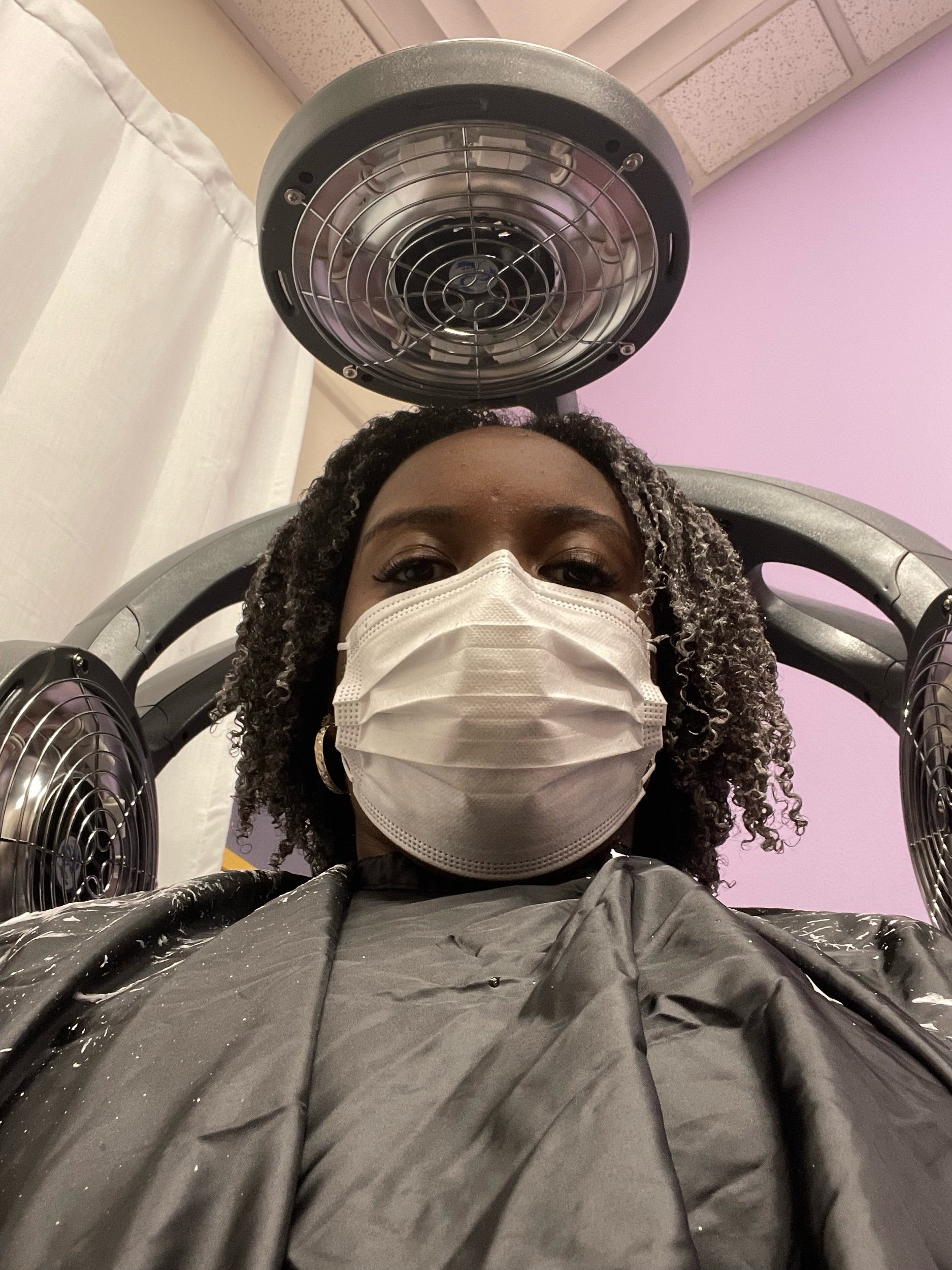  Sept 2021: Sitting under the dryer before my second curly cut. Ends look much better and there’s already a bit of length coming in. 