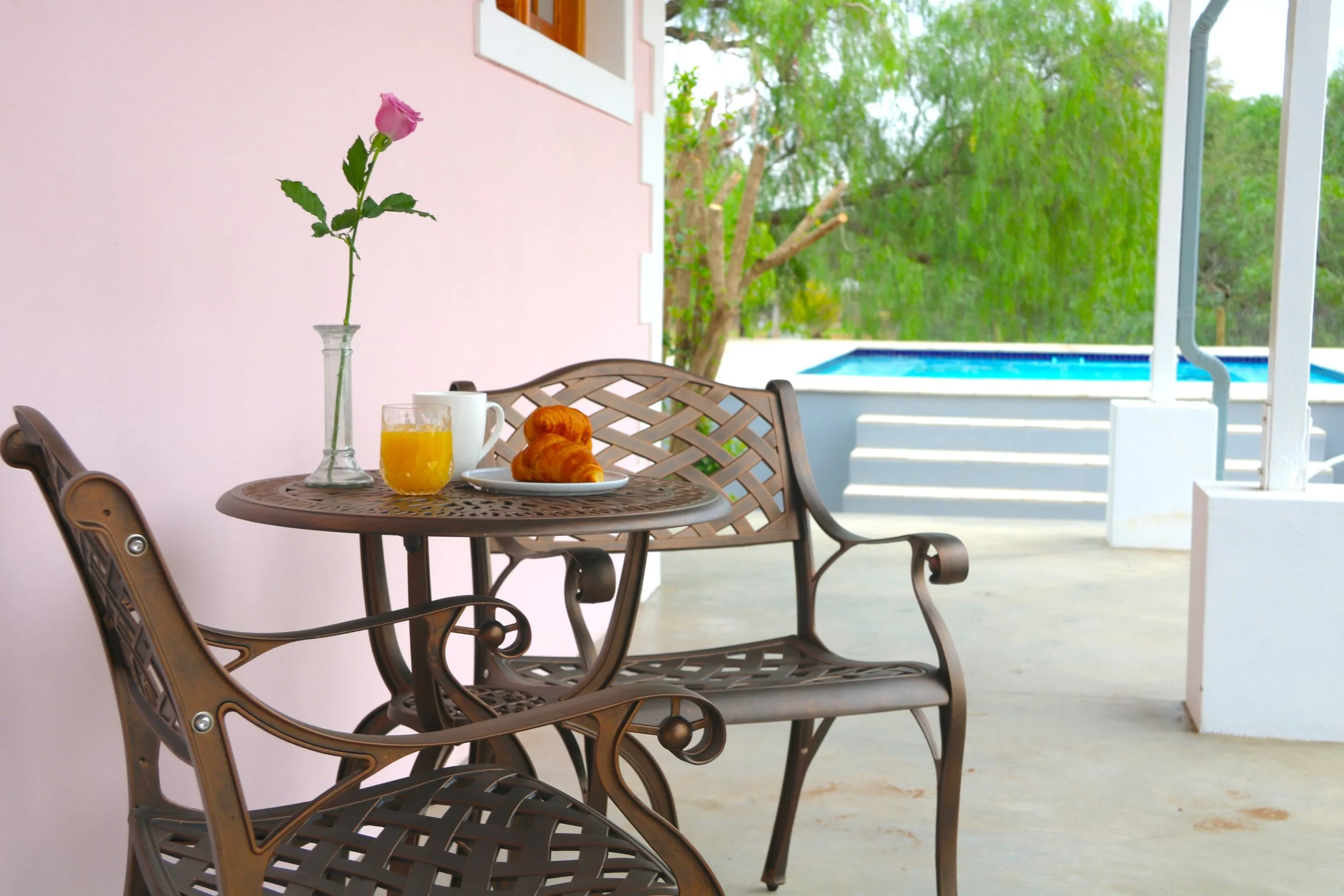 Outide sitting near the swimming pool on the veranda at Maskam Manor guest house Vanrynsdorp