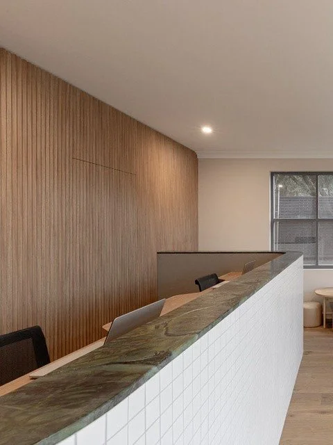 Front desk for Lambton Foot Clinic. 

Where joinery meets stone &amp; curves create calm.

Interior Design @moriandcurllstudio
Builder @forever_build
Joiner @urbanjoinery
Stone @unrivalled.stone
Flooring @great_southern_floors
Electrical @allpowercon
