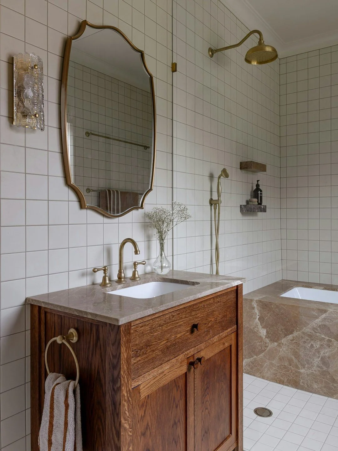 Honouring timeless design. This bathroom marries classic materials with bespoke elements, creating a space that feels both current and connected to its roots.

Interior Design @moriandcurllstudio 
Photography @life.instill 
Builder @forever_build 
Jo