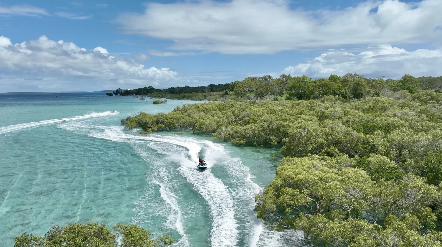 Jetski riders exploring Moreton Bay Islands on a half-day adventure tour