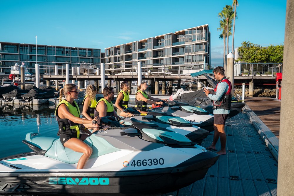 Jetskis lined up at Sanctuary Cove Marina