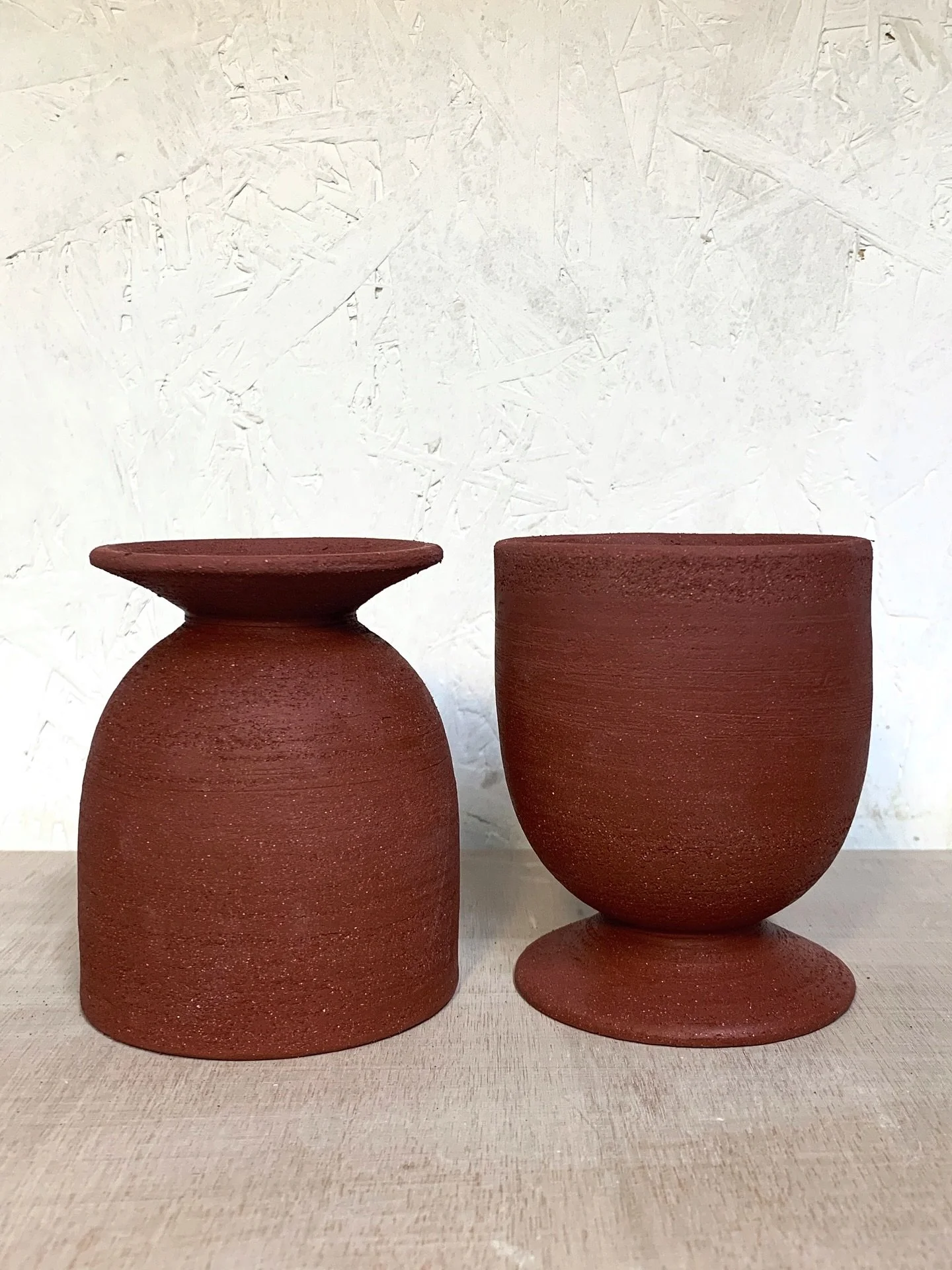 Goblets for stronger beverages, pre and post glazing &amp; firing. 

The richest sandy red stoneware, textural when raw and smoothed with glaze.