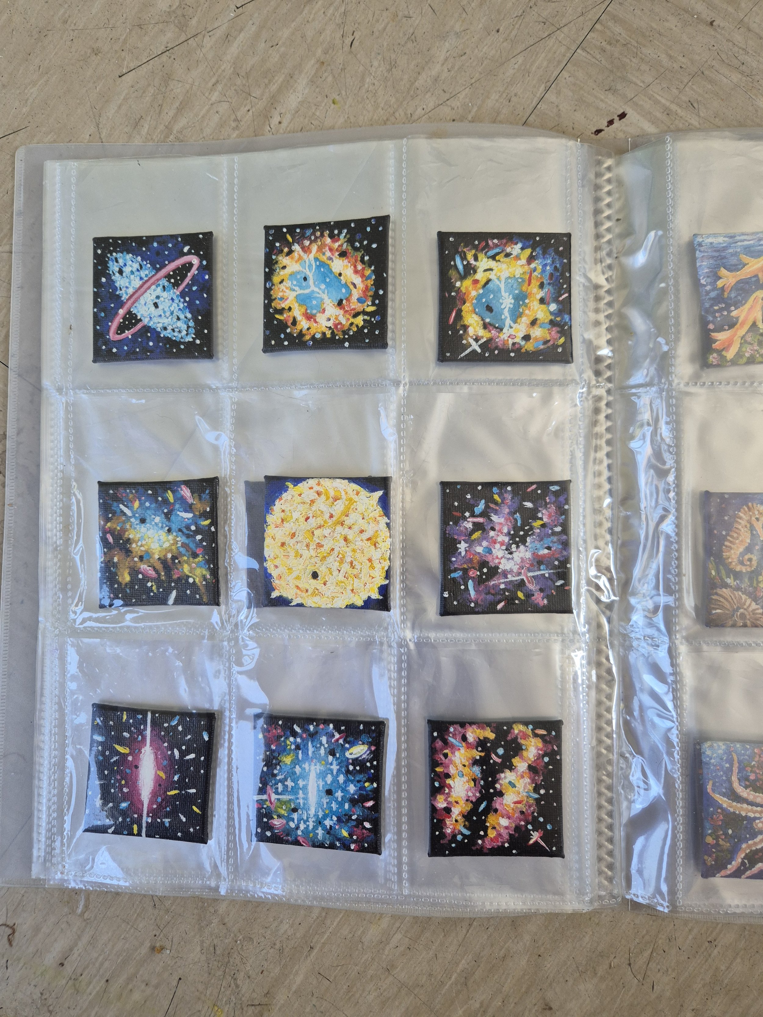 Collection of micro-miniature cosmic oil paintings by  JC Barber