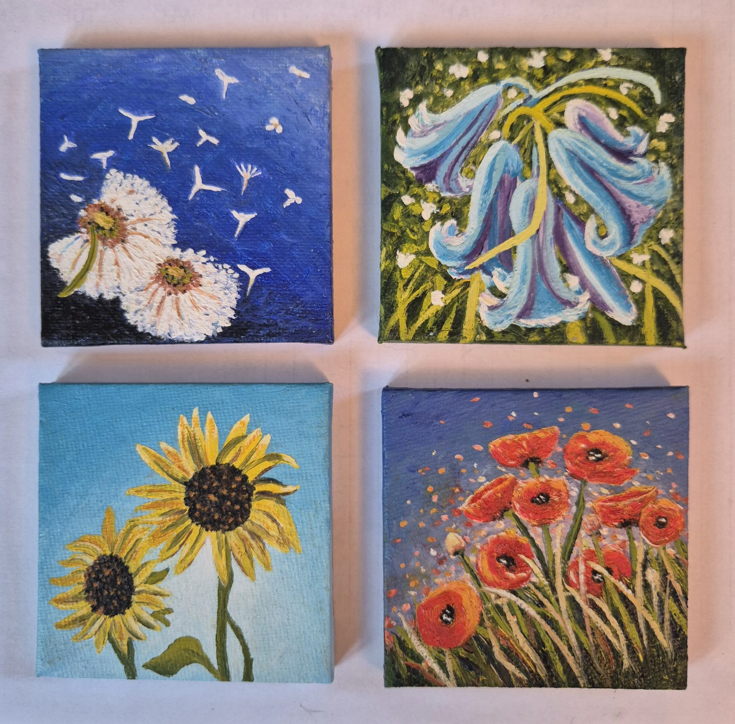 Miniature floral oil painting of sunflowers, poppies, and bluebells by JC Barber