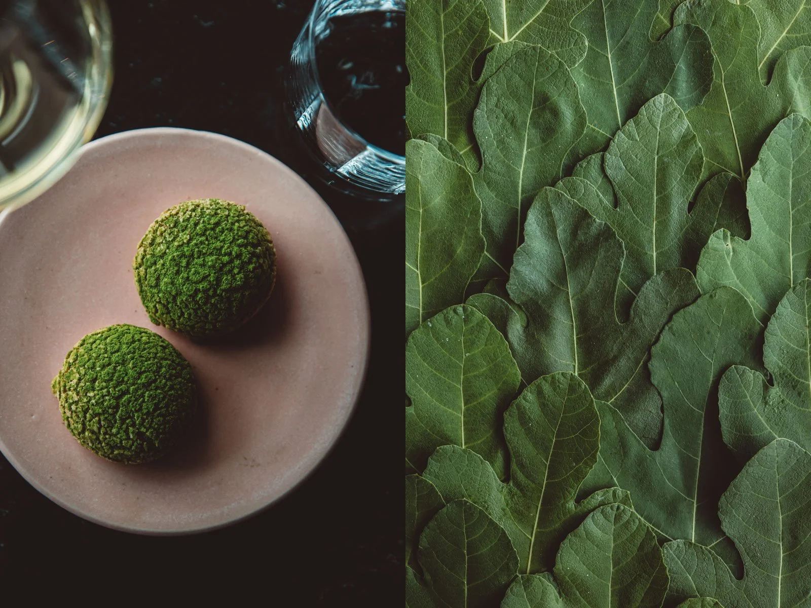 Close-up of green broccoli florets on a pink plate with glasses of water in the background, and a collection of large green leaves. Restaurant Putaine, Rotterdam, The Netherlands Photography Sophia van den Hoek