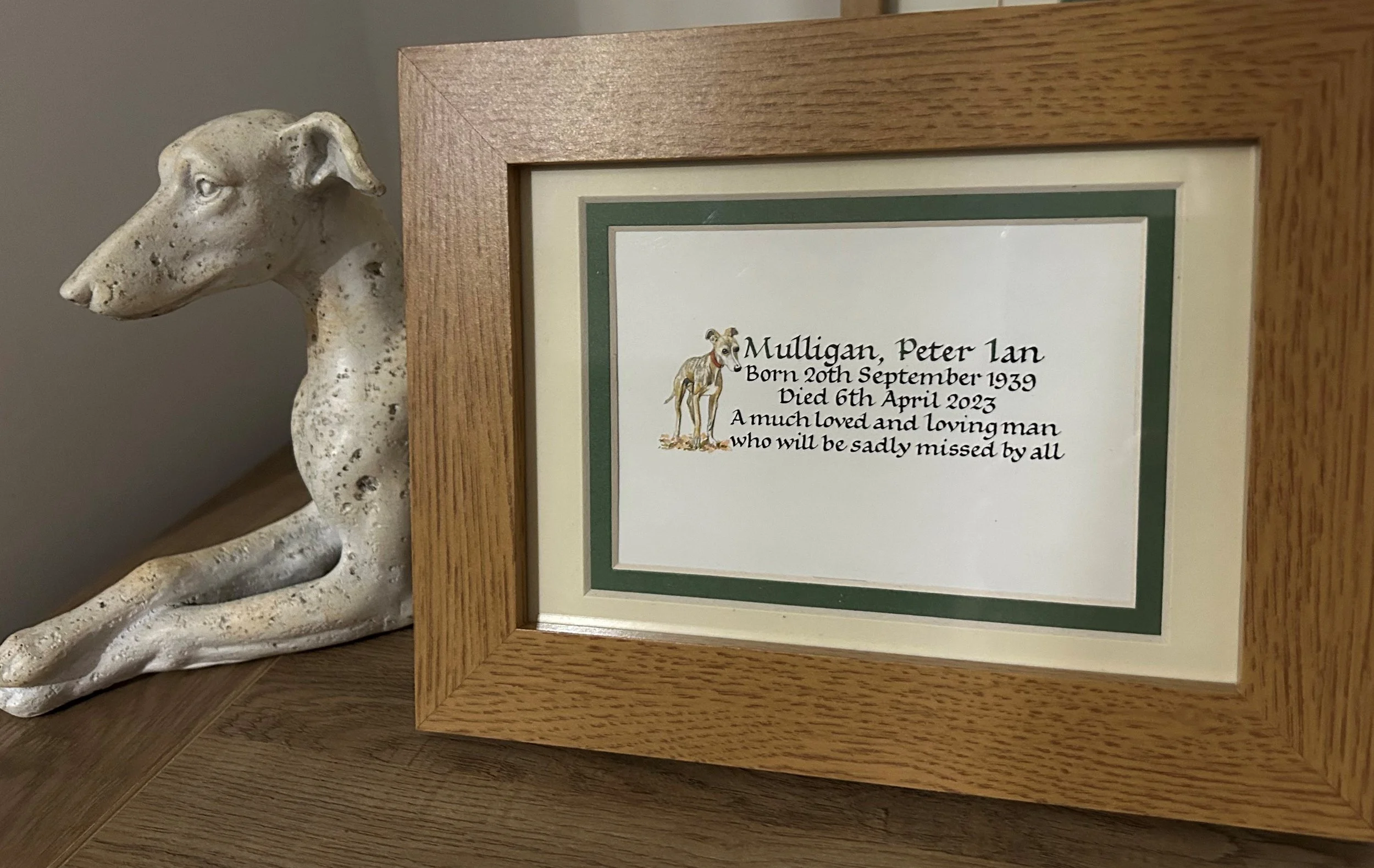 Framed copy of book of remembrance entry