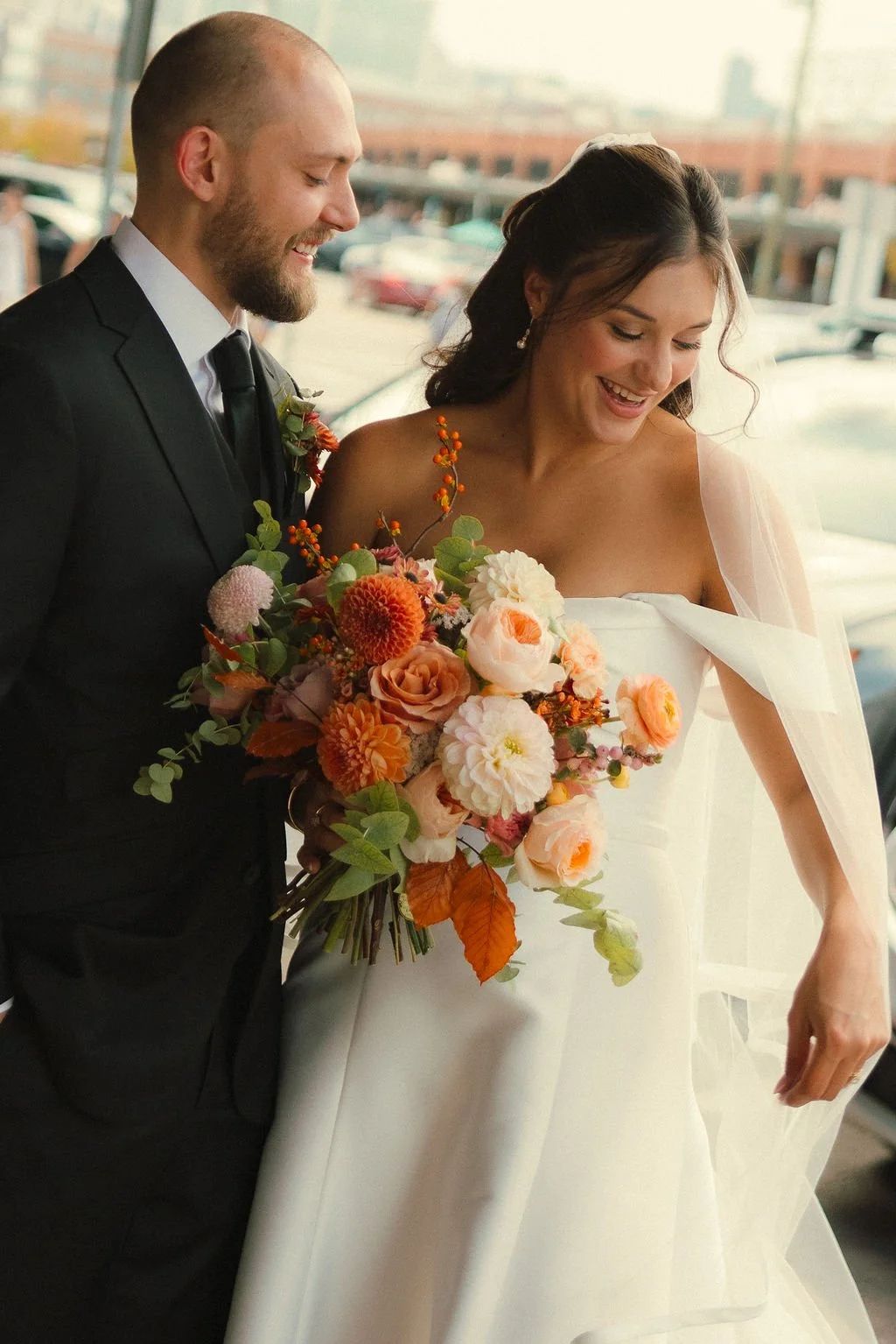 bride-with-fall-bouquet-strip-district.jpg