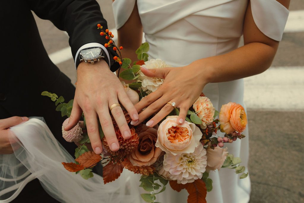 wedding-couple-flower-rings-pittsburgh.jpg