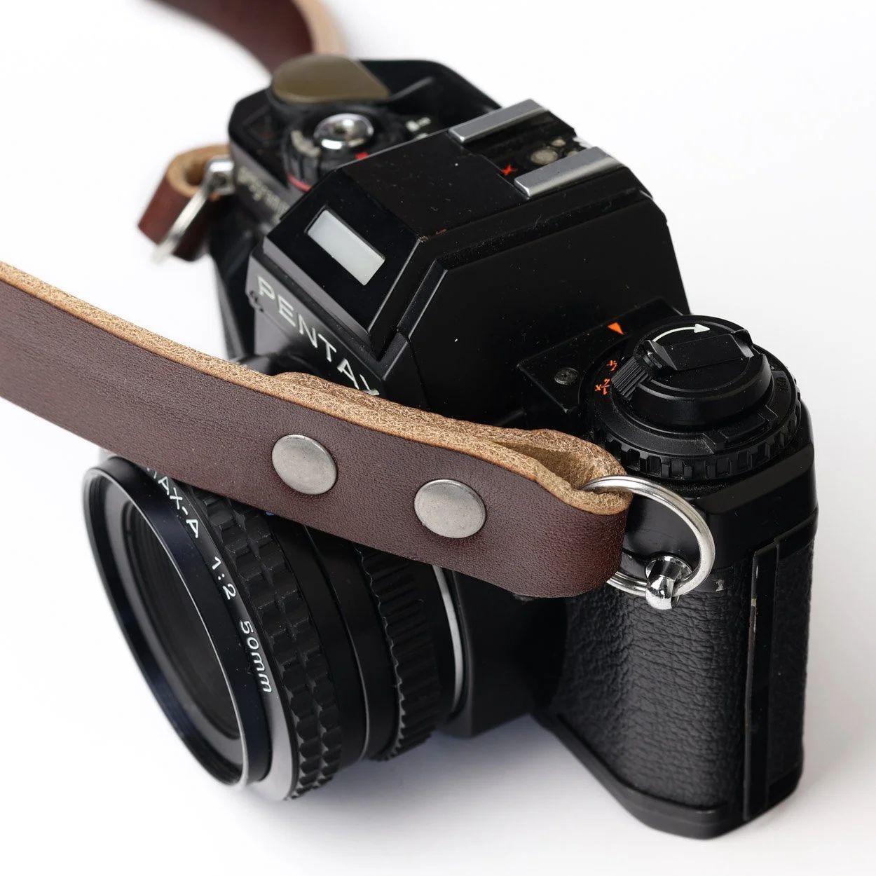 Vantage camera strap close-up on a vintage Pentax film camera