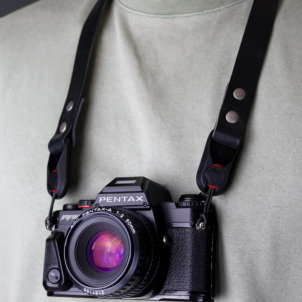 ridge peak design camera strap pentax on neck close up