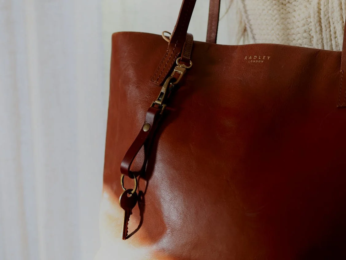 Custom leather keychain with snap on bag