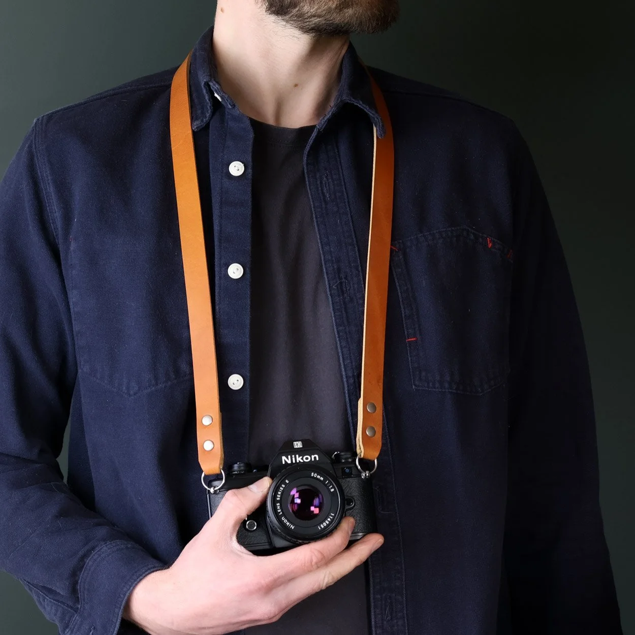 leather camera neck strap close up