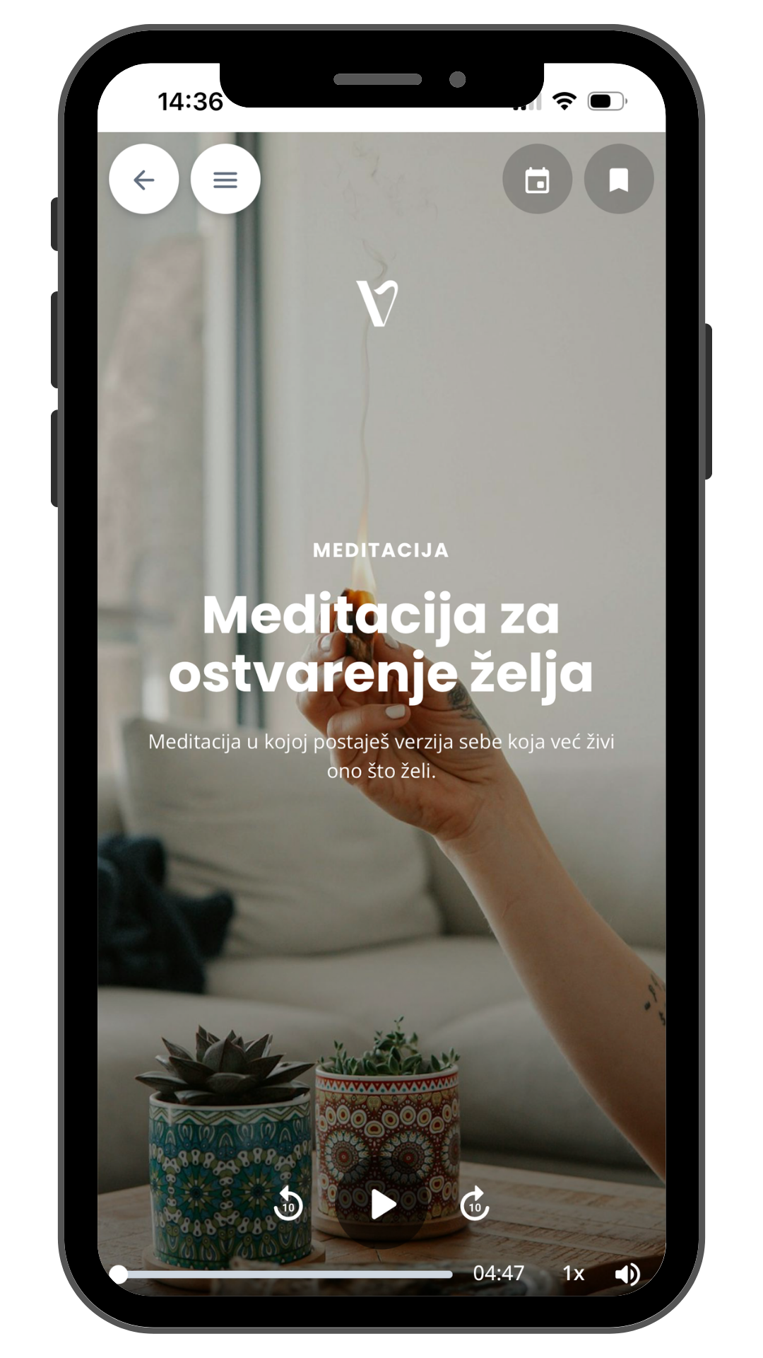 Zaslon mobilnog telefona prikazuje online meditaciju „Meditacija za ostvarenje želja” unutar studija Živi Svjesno, namijenjenu manifestaciji želja i svjesnom kreiranju života.