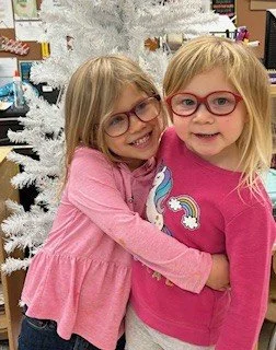 Girls with new glasses for vision