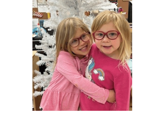 Girls with new glasses for vision