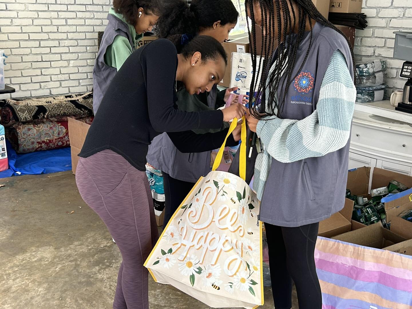 I am so proud of the East African Club at Innovation Academy. These high schoolers wanted to give back. They came to our storage space yesterday and organized a lot of clothing that was donated and made 14 hygiene bags. We then visited refugee famili