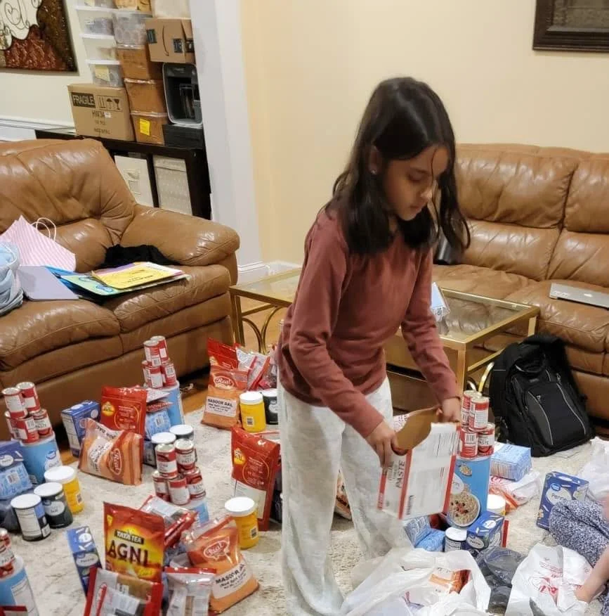 We love when families bond over volunteerism. Longtime supporter and friend of Ethaar, Hera, rounded up her kiddos and kicked off summer vacation in the best way possible. Together, they collected funds, purchased food staples, and packed bags for fa