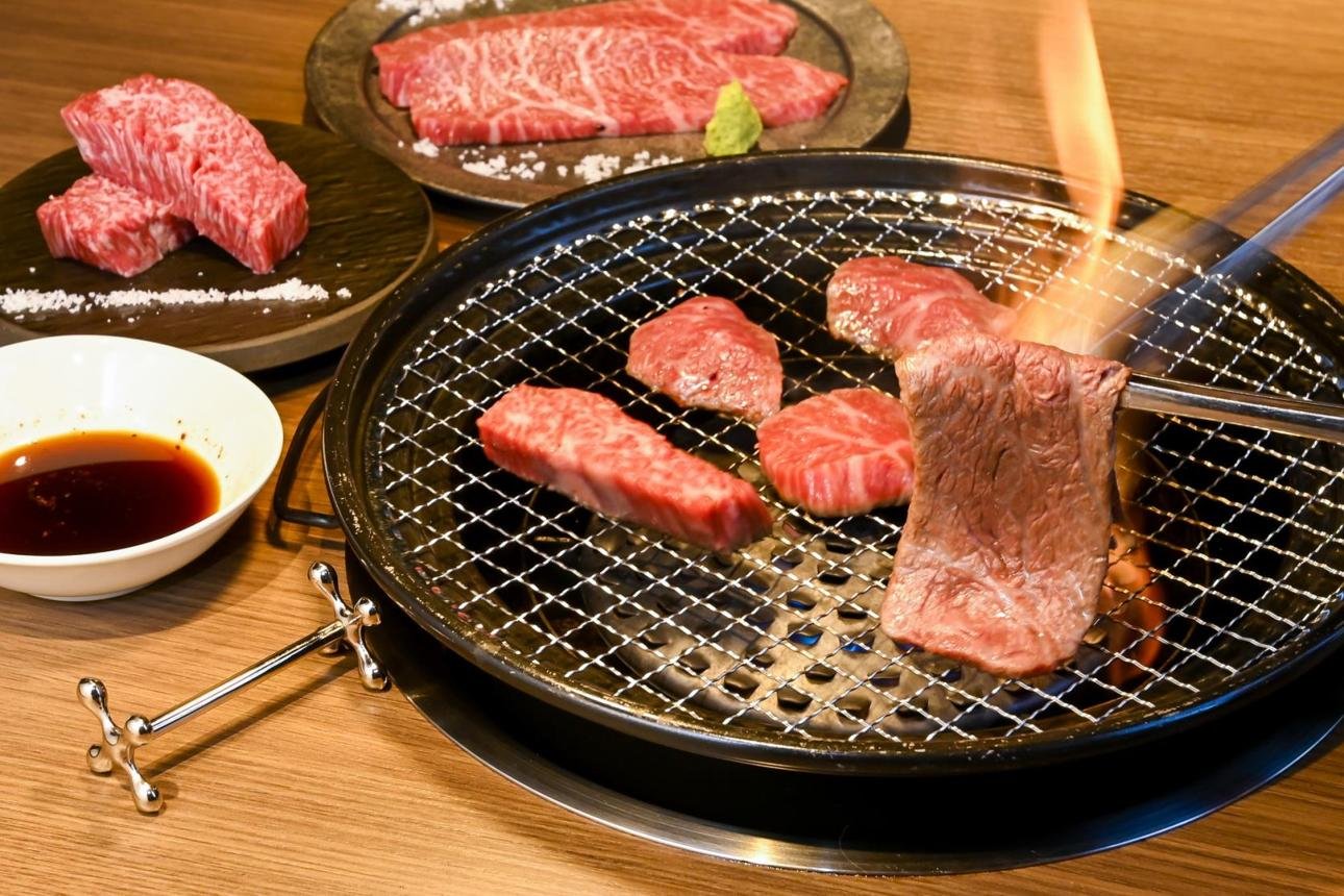 A5 Japanese Wagyu steak from Kagoshima served medium rare with premium marble texture at Umami Ashland fine dining restauran