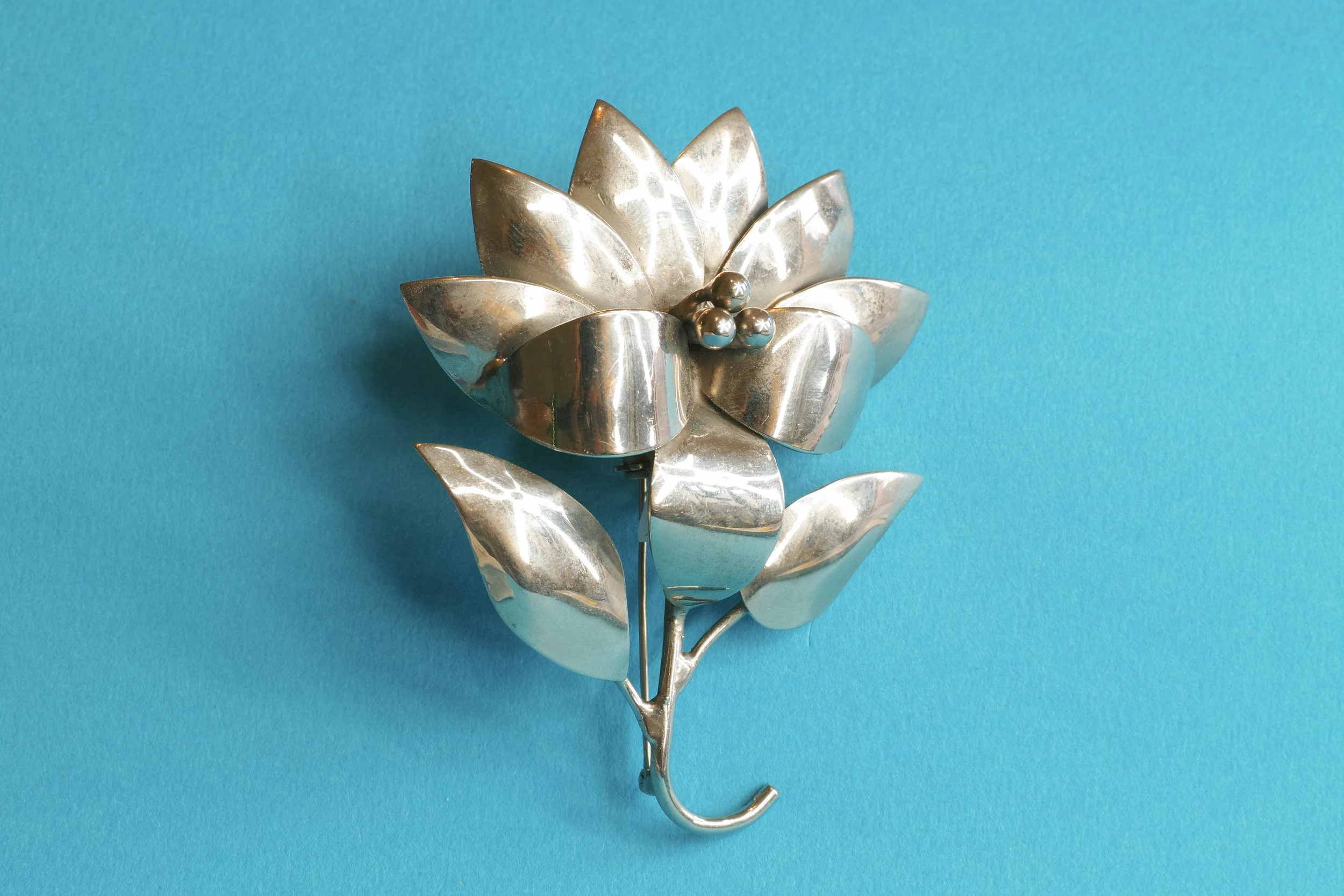 Silver floral pin