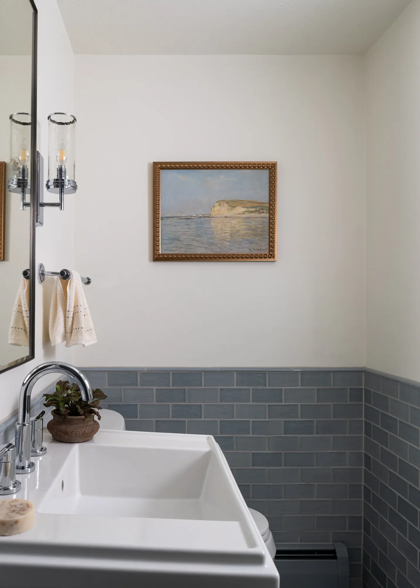 bathroom-blue-tile-wainscoting-vintage-art-oberlin-studio-vae-san-francisco.webp