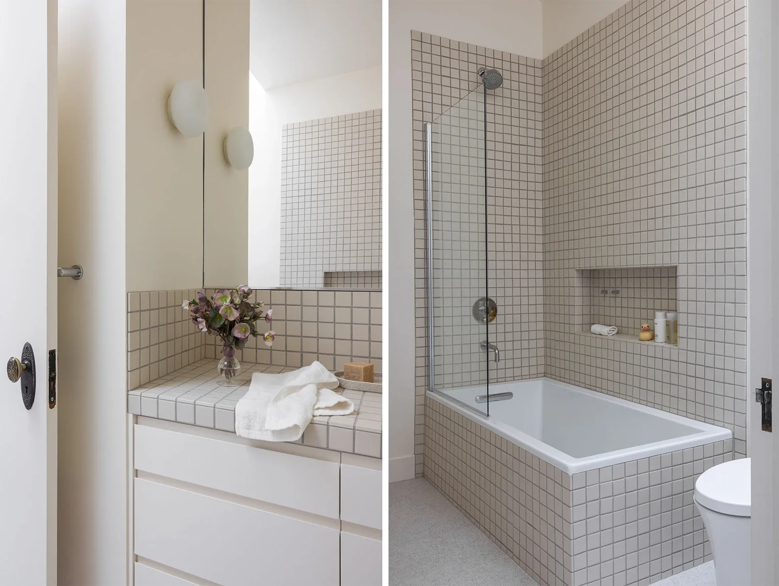 Bathroom renovation in Parnassus Heights, San Francisco featuring white square tile vignette around the tub surround and shower with recessed niche and glass panel