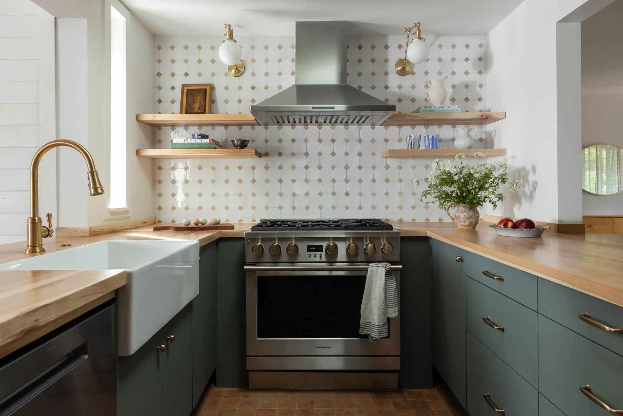 studio-vae-pacific-heights-ca-discovering-your-design-aesthetic-renovated-kitchen-butcher-block-countertop-blue-cabinetry-refined-design.jpg