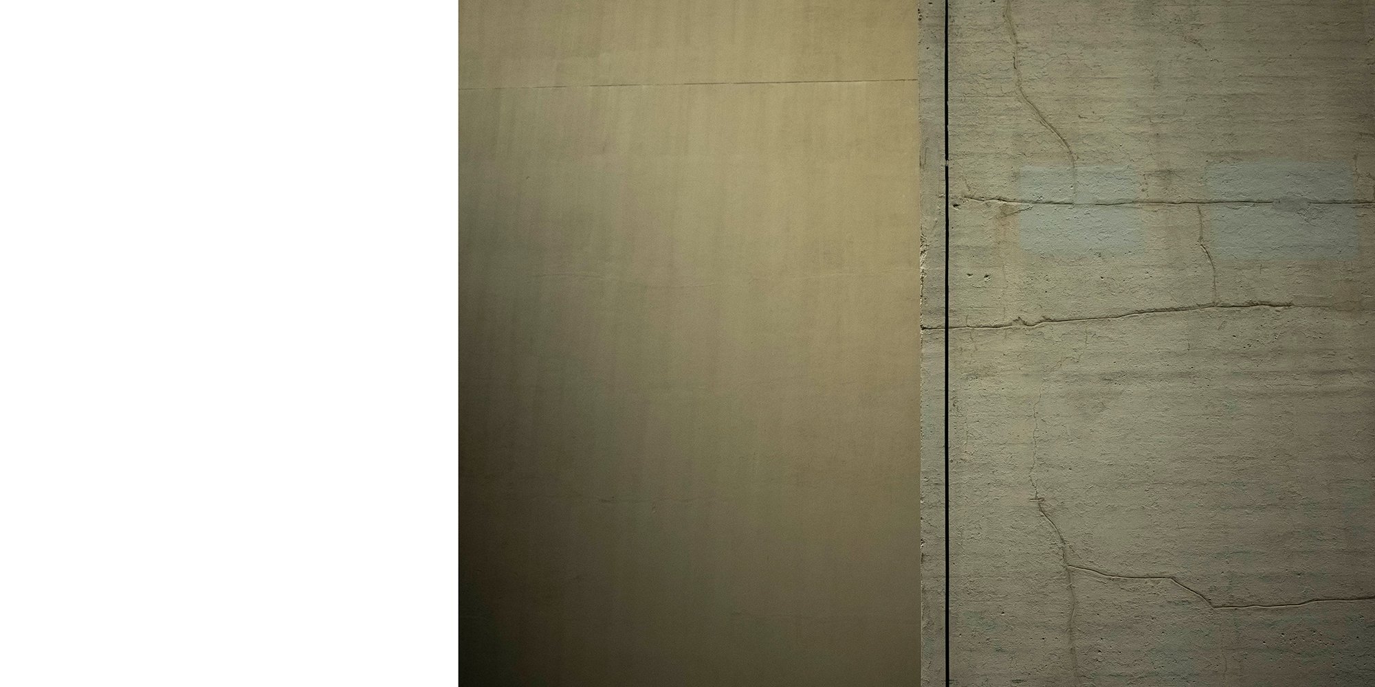 A close-up of three different wall textures: metal, drywall, and concrete.