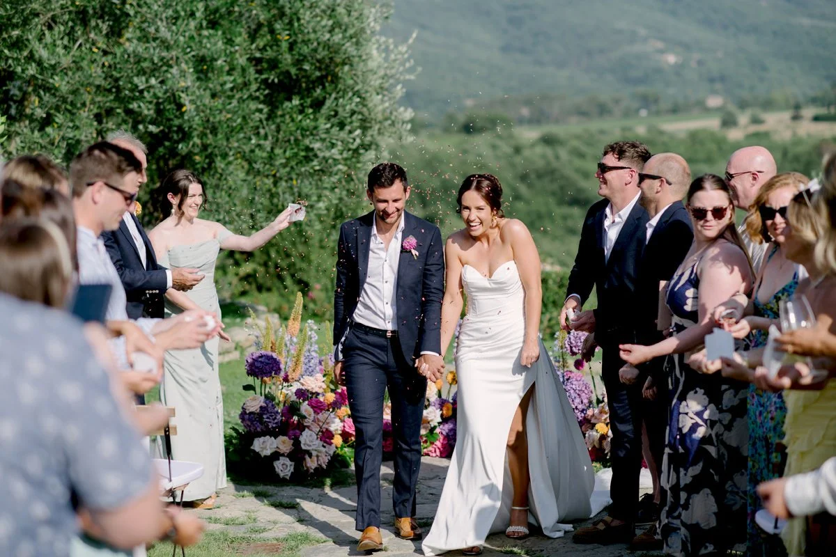 Couple walking after wedding ceremony