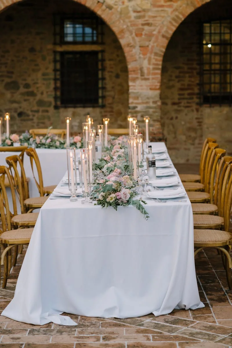 Wedding dinner setup at Villa Boscarello with decorated tables prepared before guests arrive.