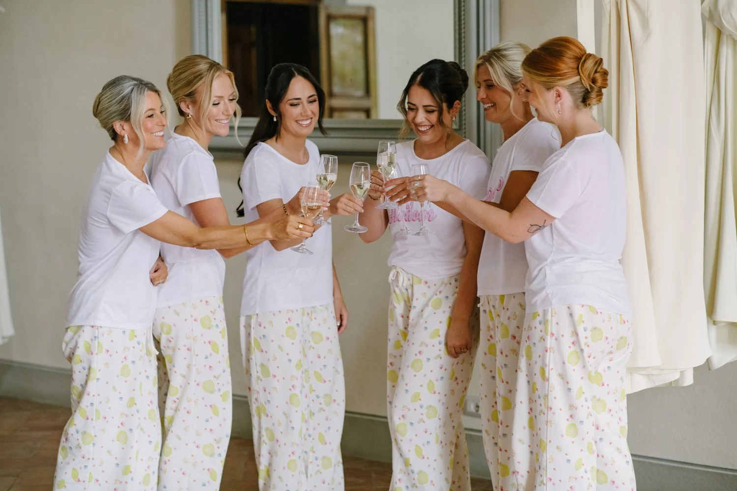 Bridesmaids toasting with prosecco before the ceremony at Villa di Ulignano, FunkyBird Photography