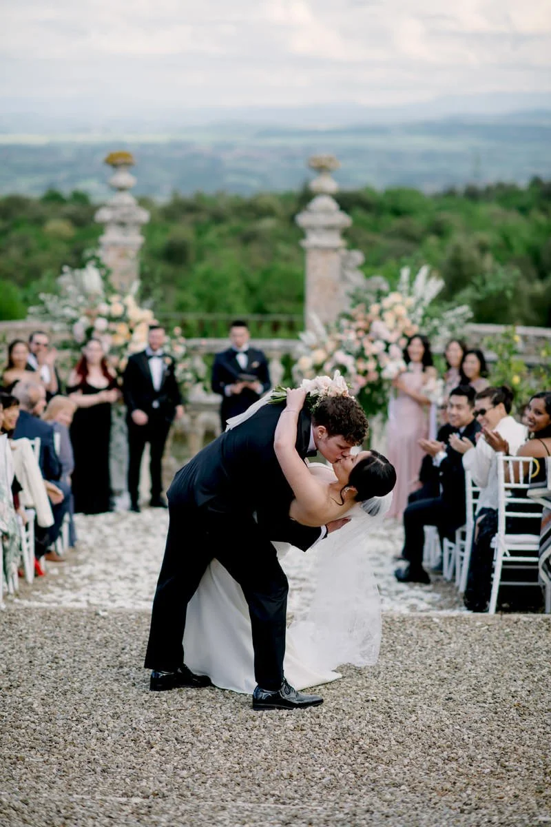 Perfect kiss at the ceremony in Castello di Celsa wedding captured by Tuscany wedding photographer FunkyBird Photography