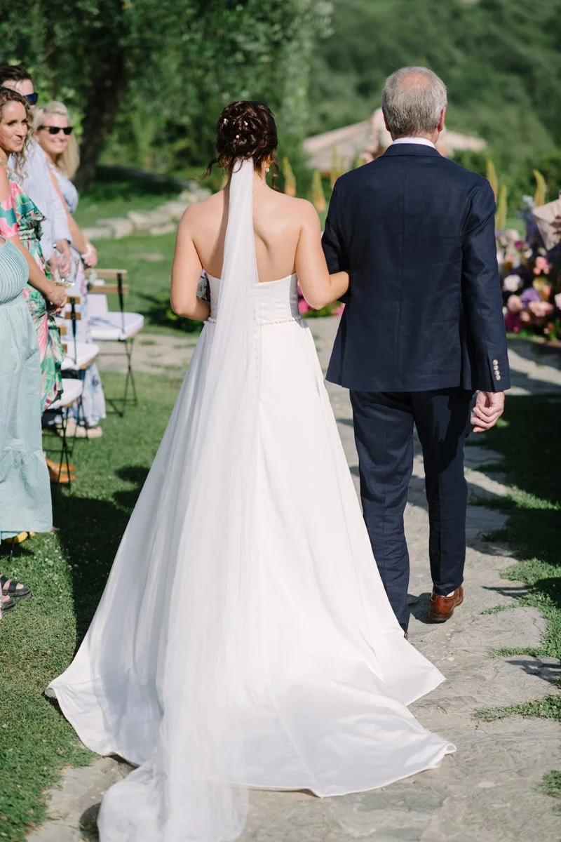 bride at the ceremony with her father