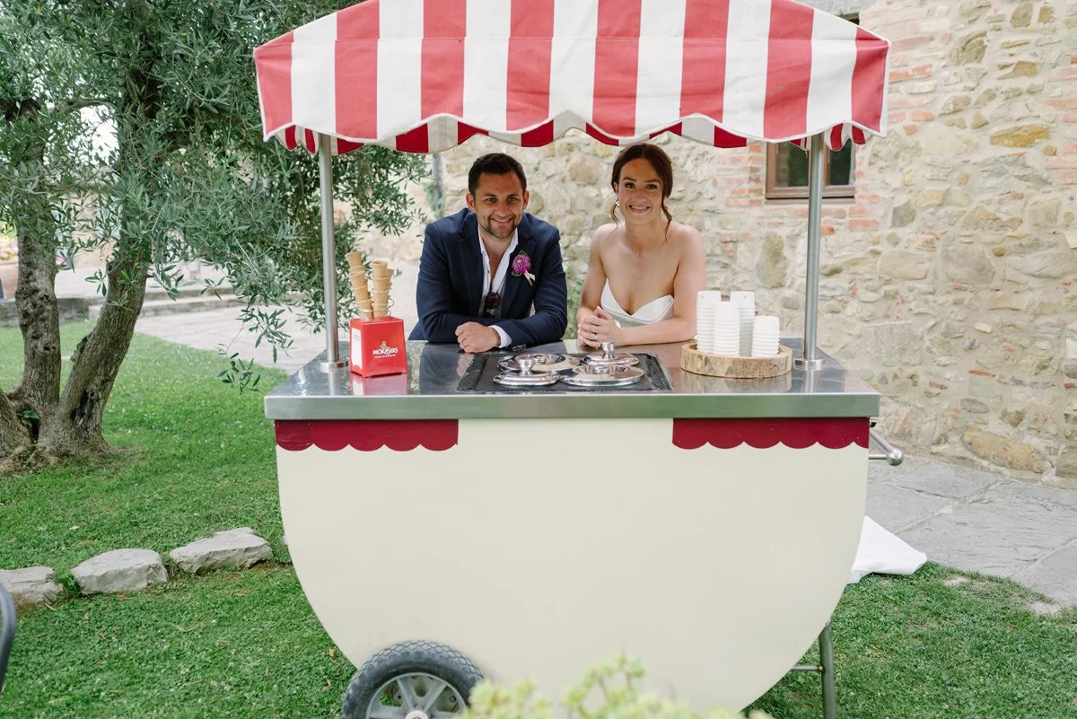 Bridal couple with ice cream cart