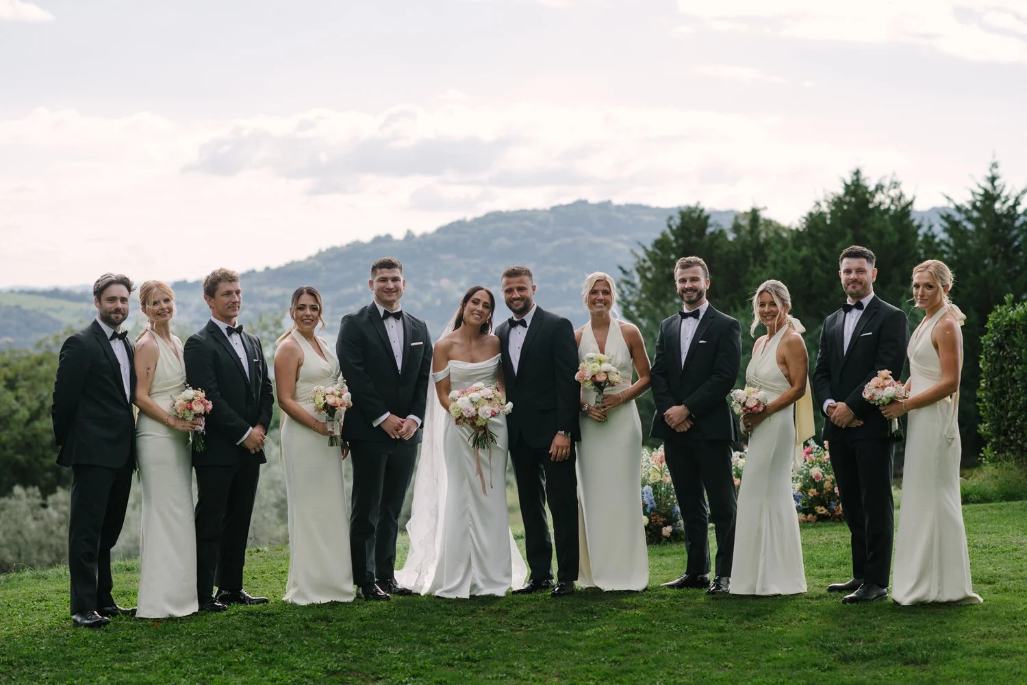 Full bridal party of five bridesmaids and five groomsmen with Amber and James at Villa di Ulignano, by FunkyBird
