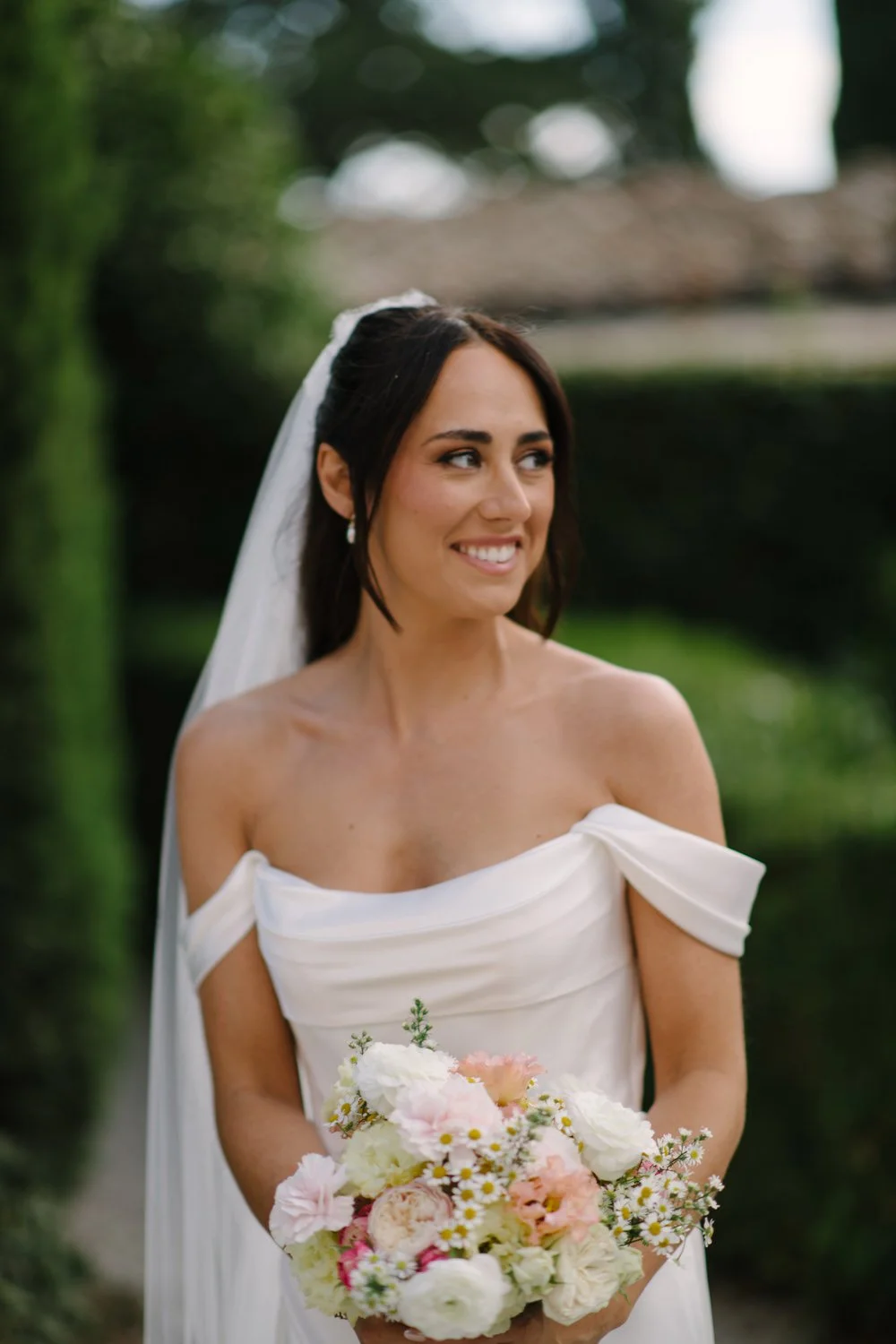 Bride smiling in her wedding dress with veil at Villa di Ulignano, October Tuscany wedding portrait by FunkyBird