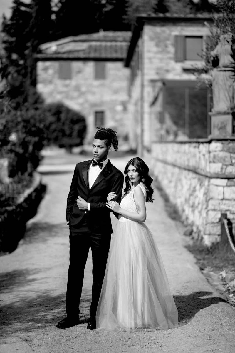 Black and white portrait of the bride and groom at Le Filigare wedding venue in Tuscany.