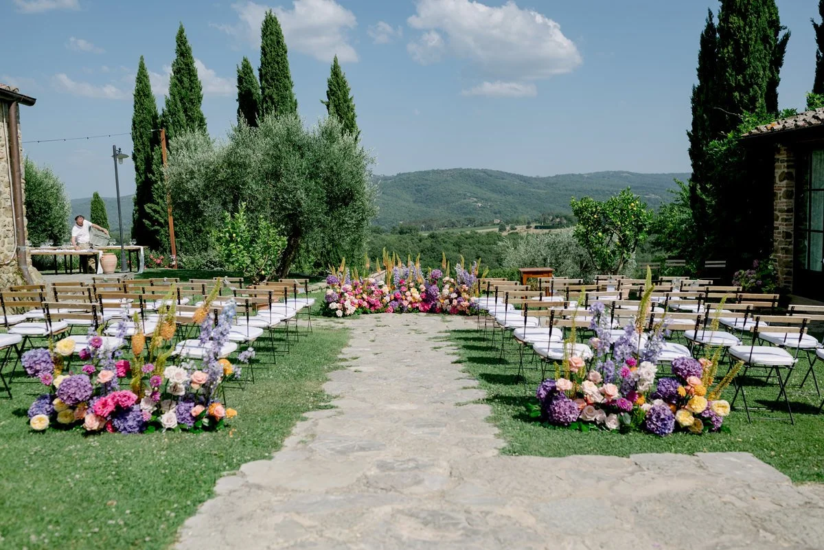 Casa Cornacchi wedding ceremony full of flowers.