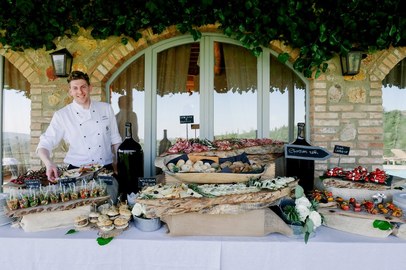 Wedding aperitivo food prepared by the chef in front of Conti di San Bonifacio villa.