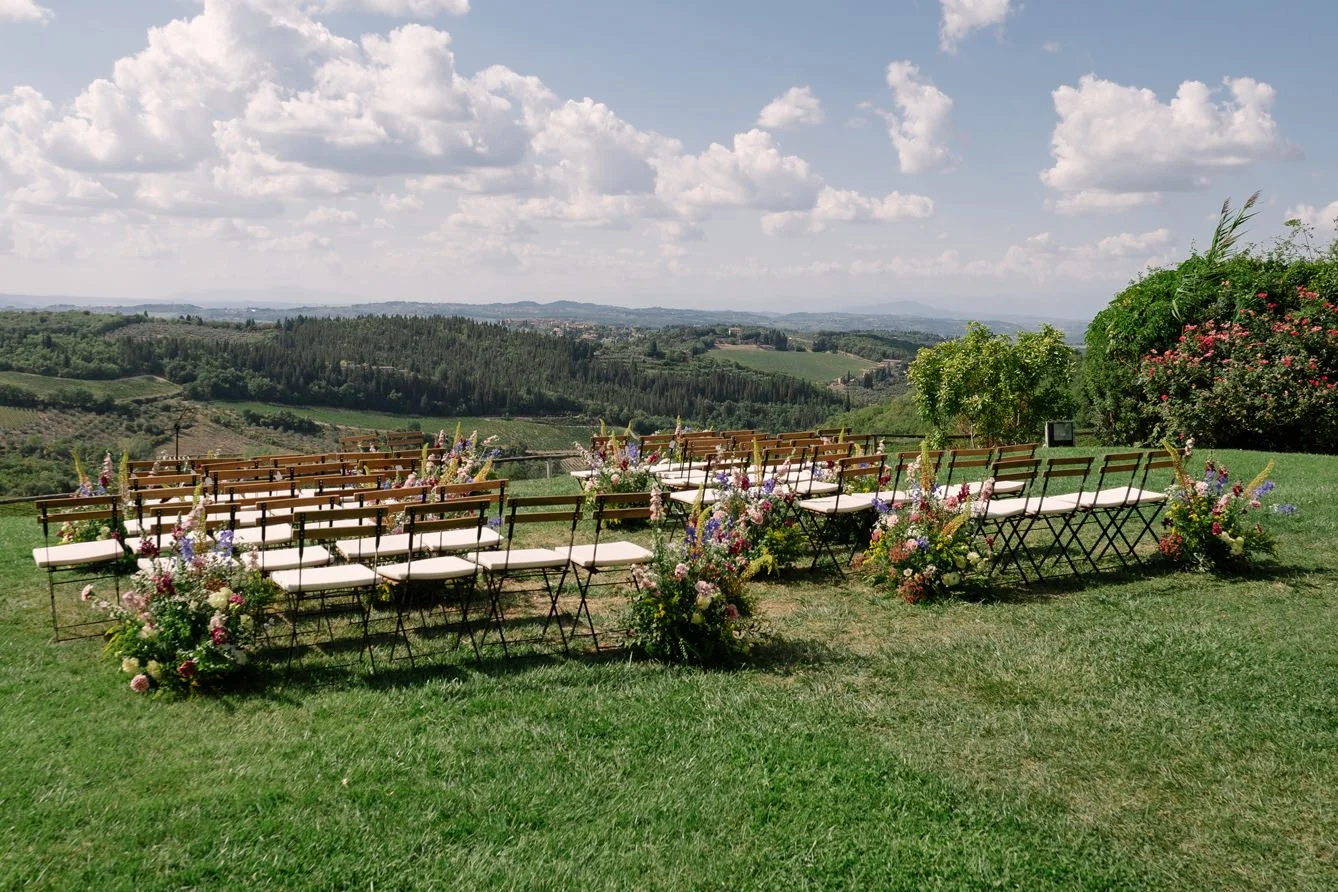 Wedding ceremony setup with floral decoration photographed before guests arrive at Le Filigare wedding venue in Tuscany.