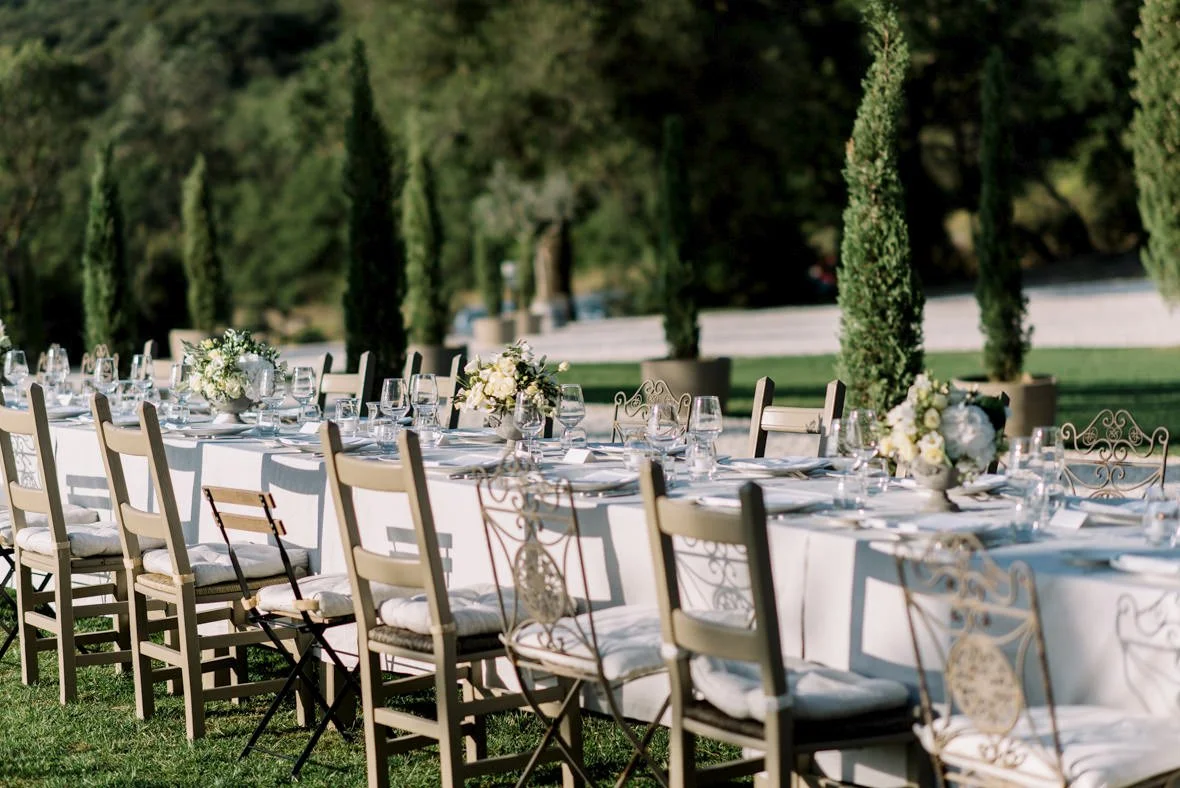 Wedding table decoration set for dinner at Conti di San Bonifacio wine estate in Tuscany.