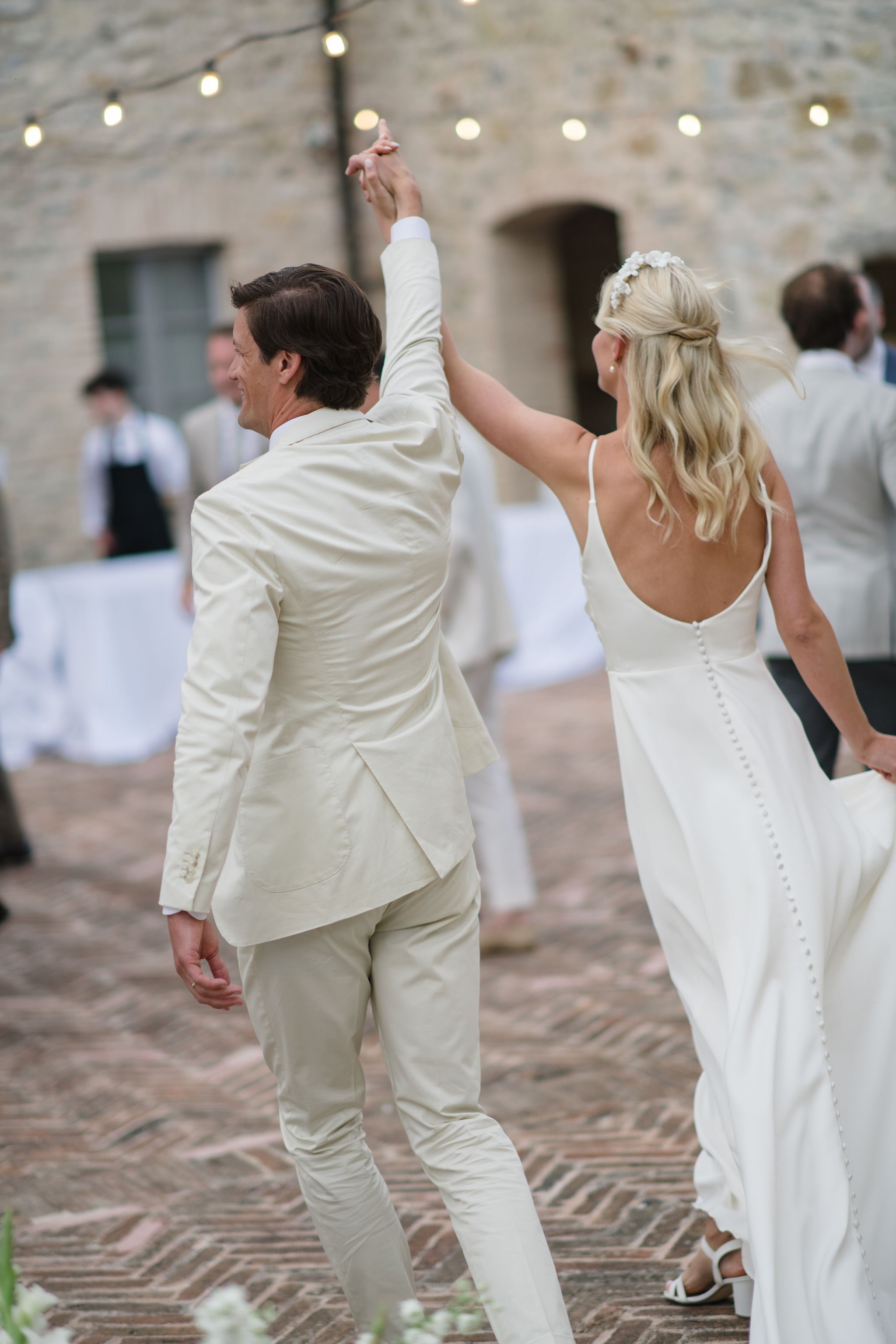 Bridal couple entering dinner