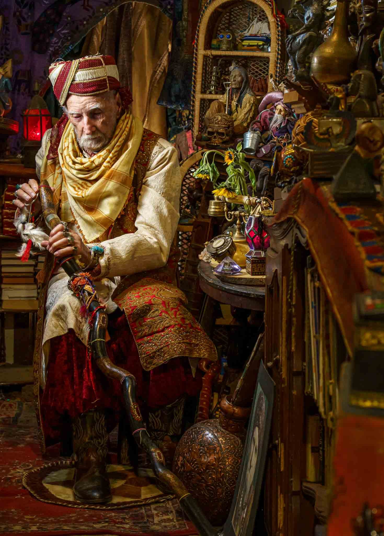 Baba Desi, the Belgrave Wizard works on his favourite staff in his home 'The Nook'. His house is a fantastical space that reminds the viewer of a fairytale . This image was a portrait semi-finalist in the 'Head On photo Festival' Sydney 2024